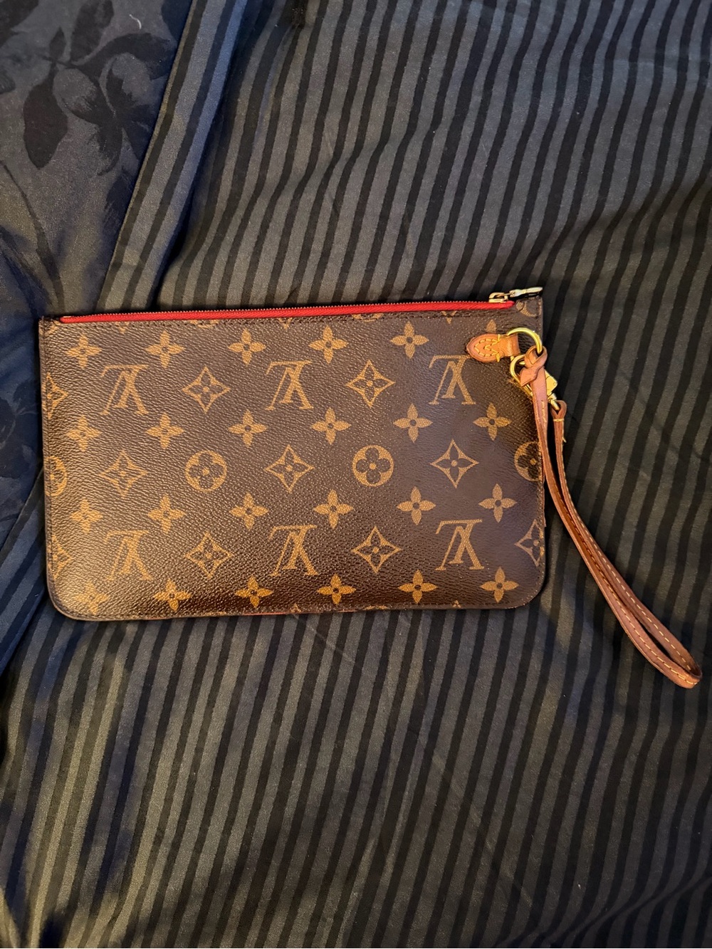 Louis Vuitton Monogram Zip Wristlet in Brown with Red Accent